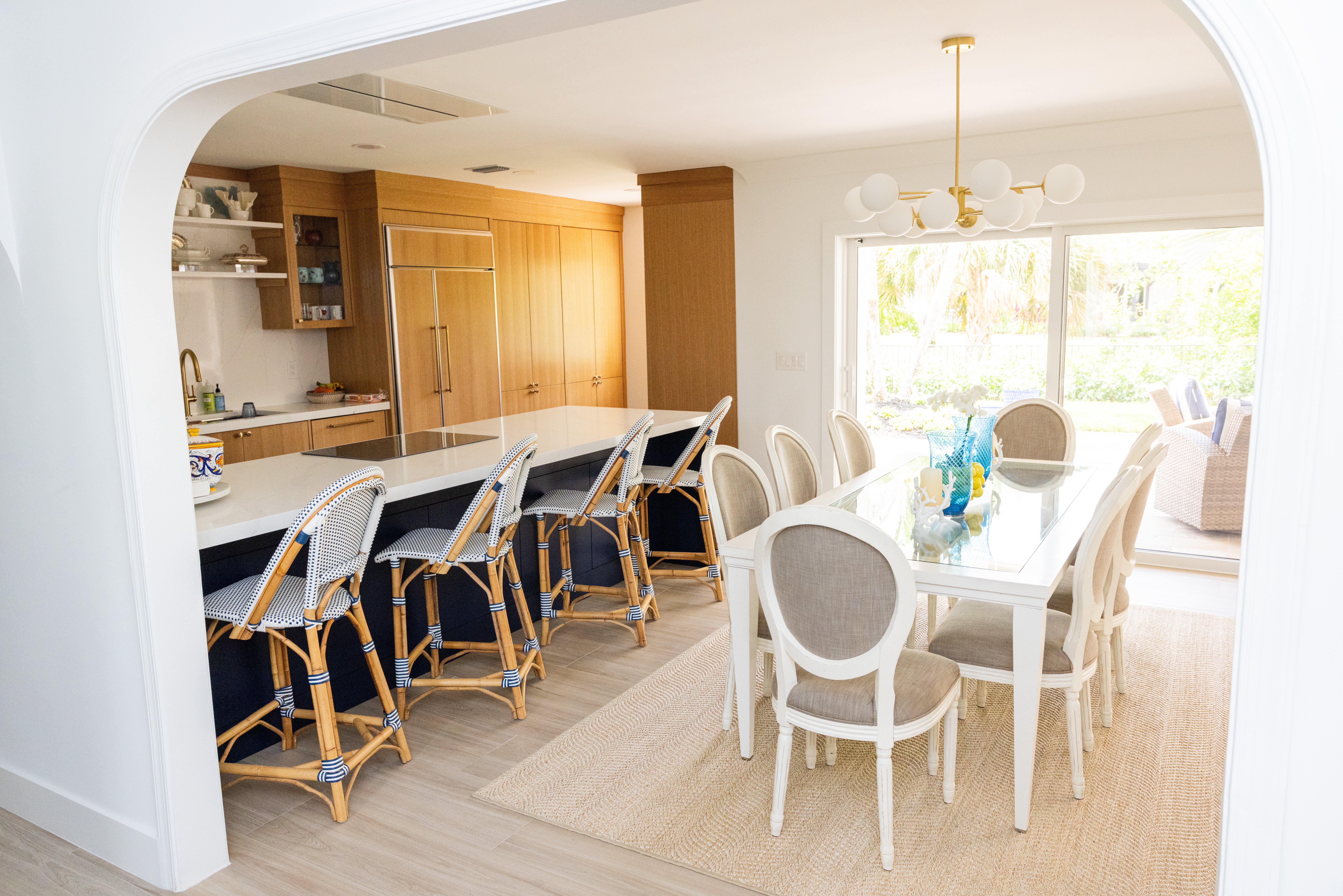 Living room with navy zebra accent chairs and wood-turned table lamps